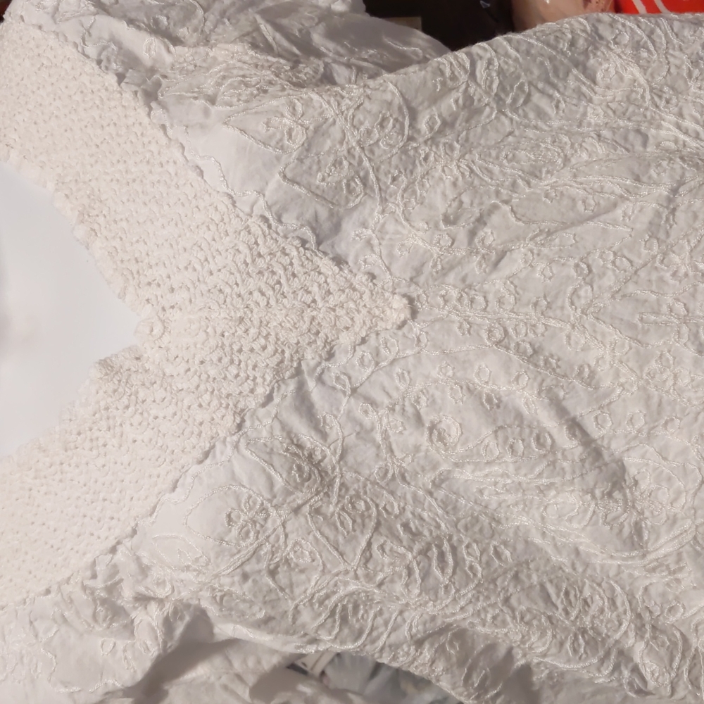 White shirt with crochet accents. Size M.